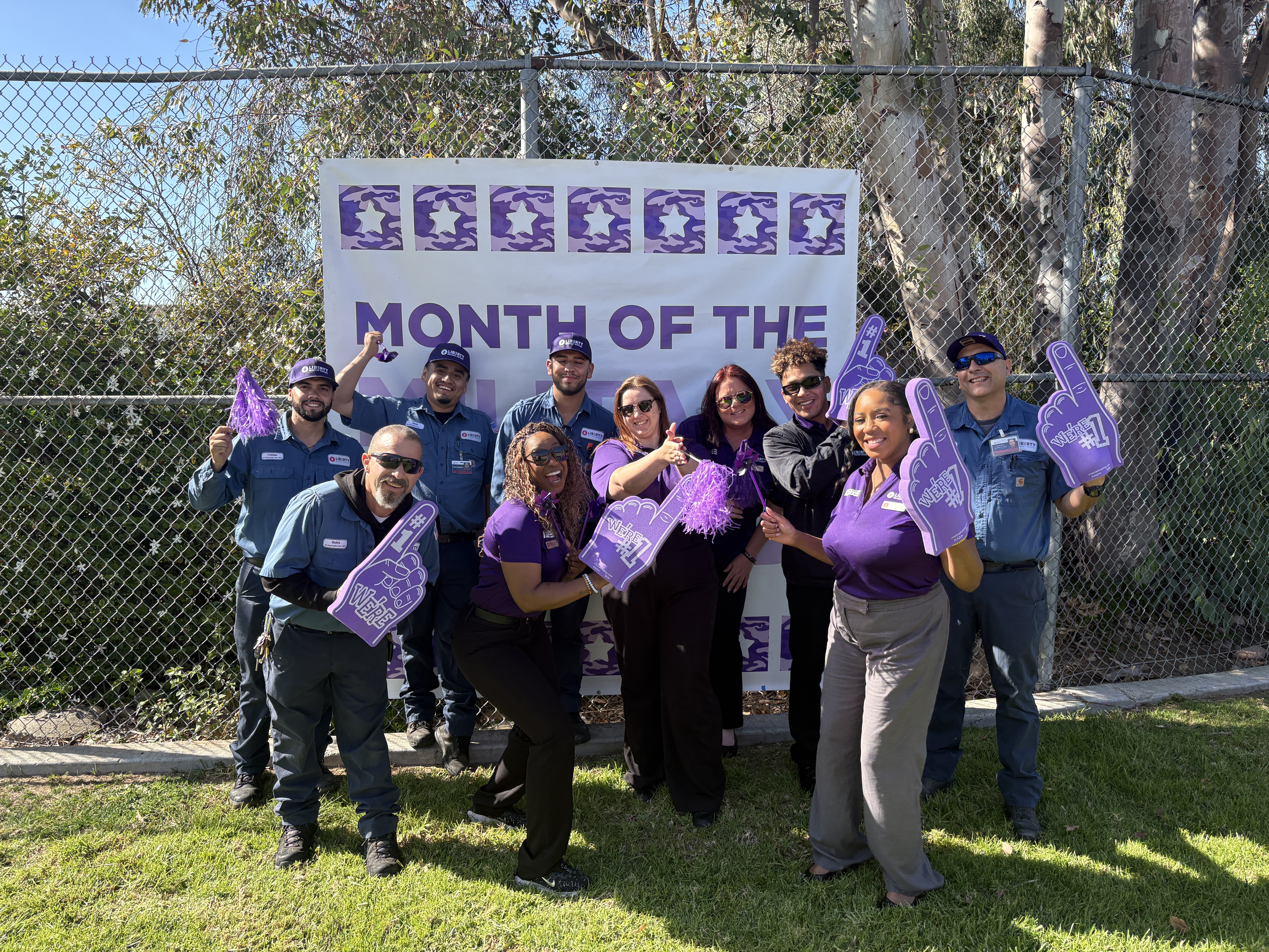 Team members wearing purple for month of military child 