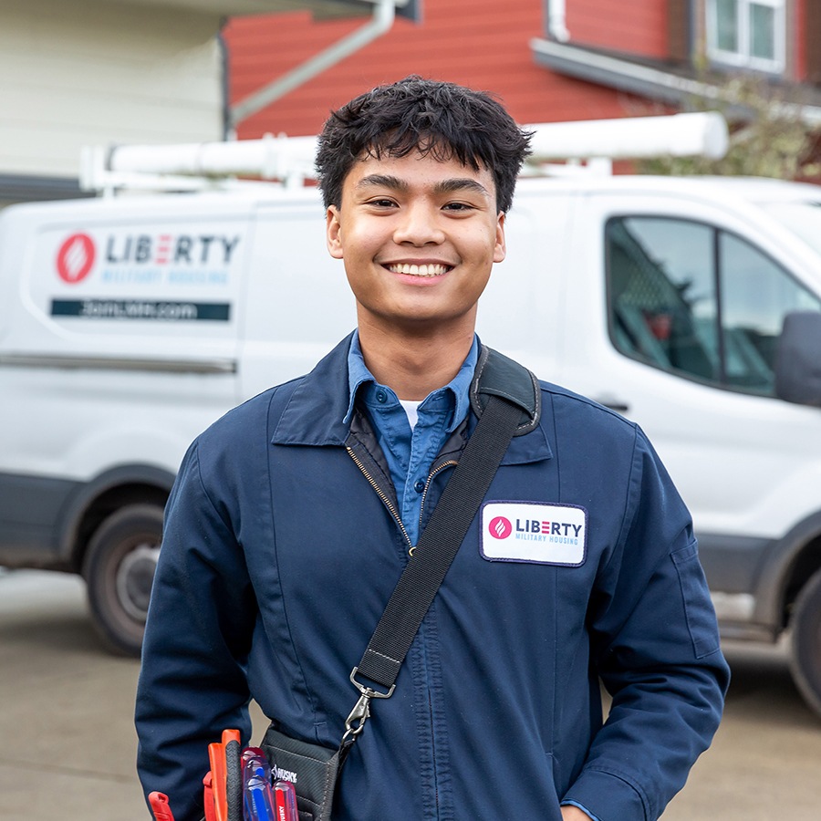 Man standing in front of a home