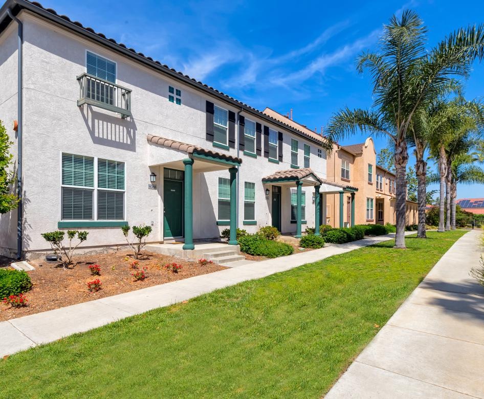 well manicured landscaping in front of homes