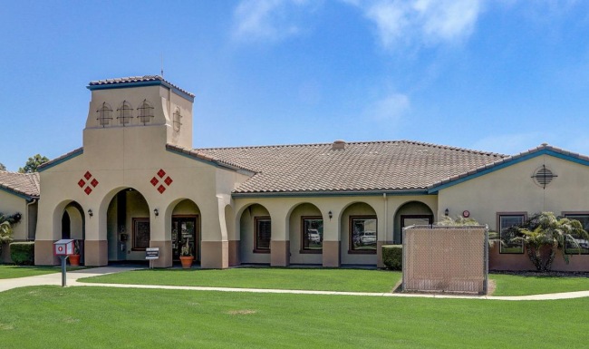 a building with a lawn in front