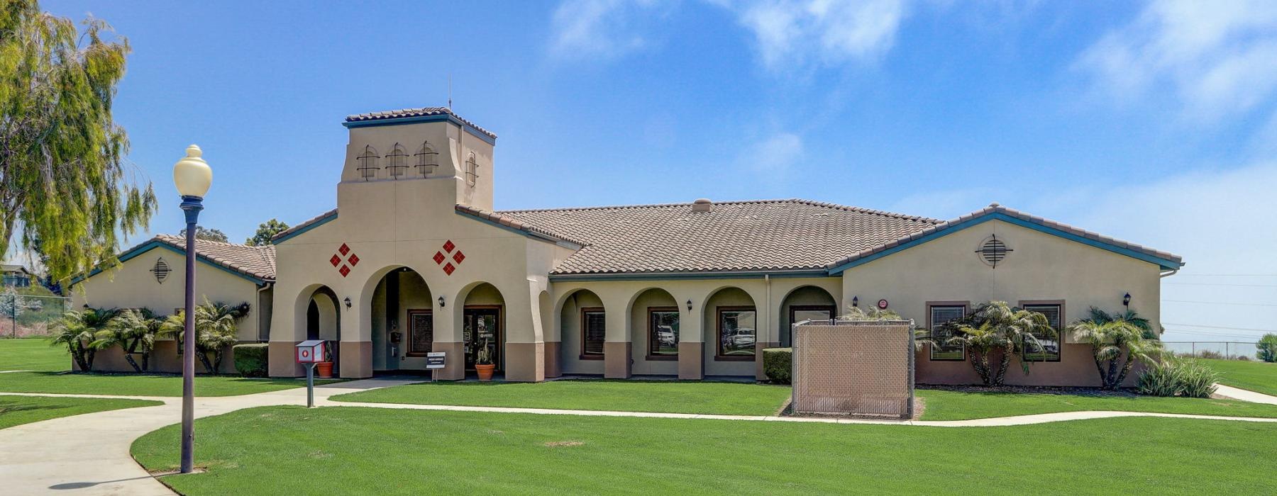 a building with a lawn in front