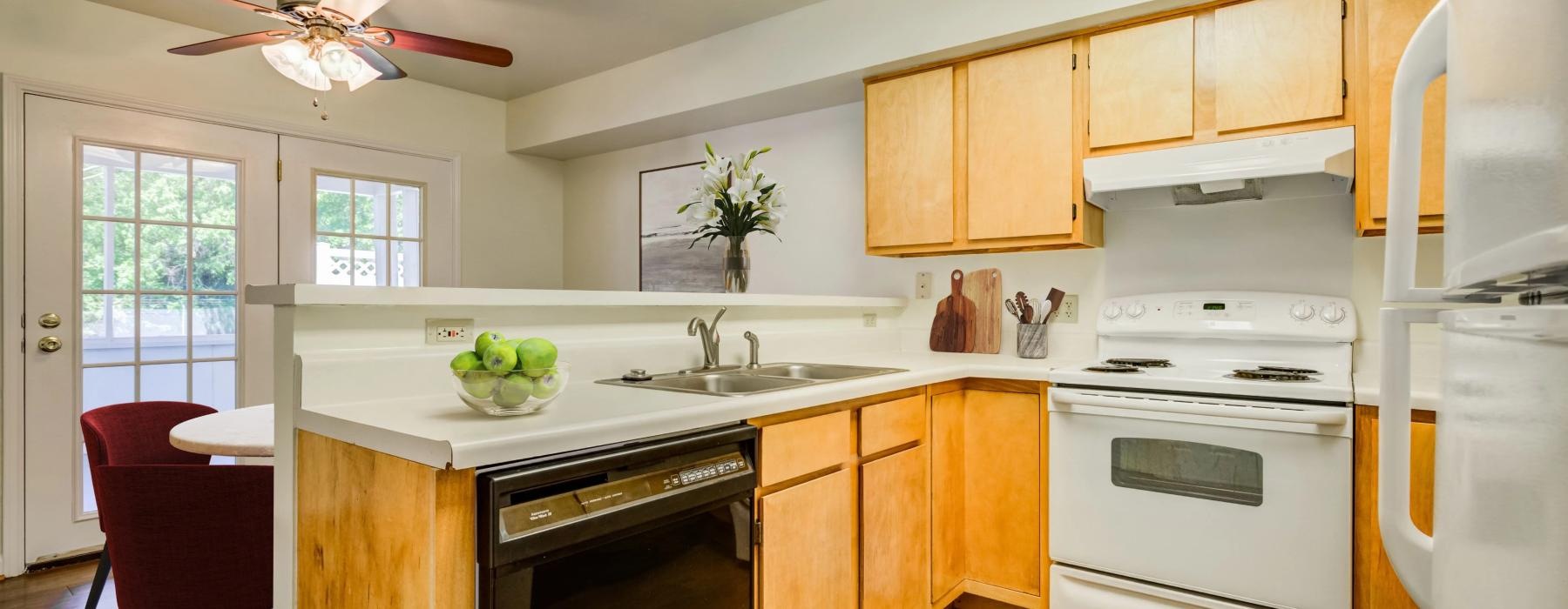 a kitchen with an oven and dishwasher