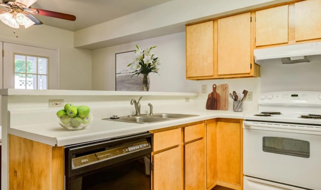 a kitchen with an oven and dishwasher