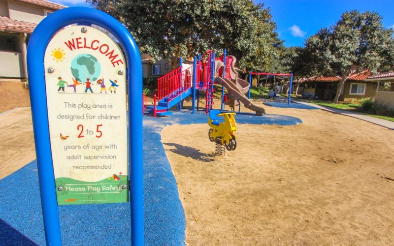 a sign in a playground