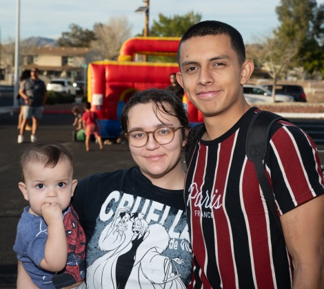 A family of three at Liberty's Adobe District 