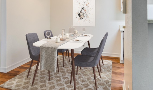 a dining room table with chairs