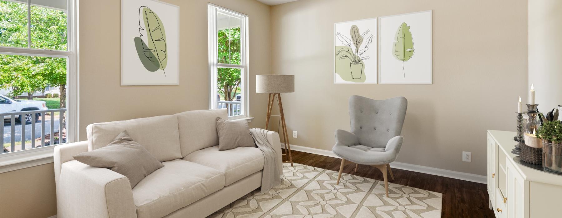 a living room with a couch and a fan