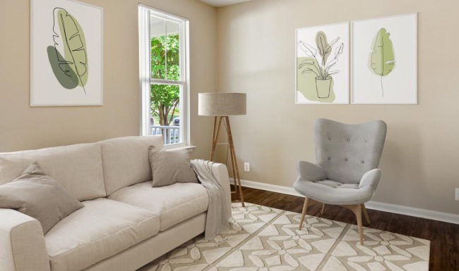 a living room with a couch and a fan