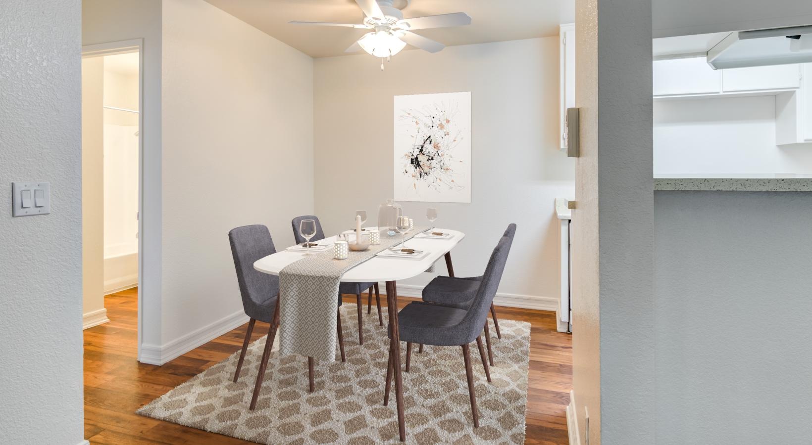 a dining room table with chairs