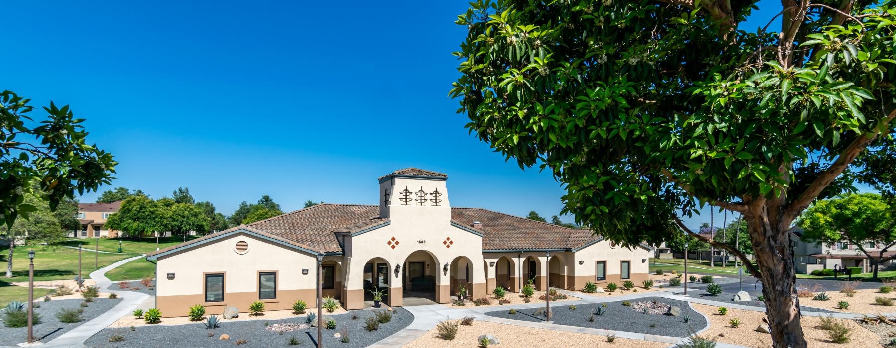 a building with lush landscaping