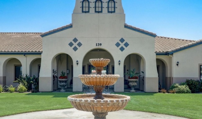 a fountain in front of a building