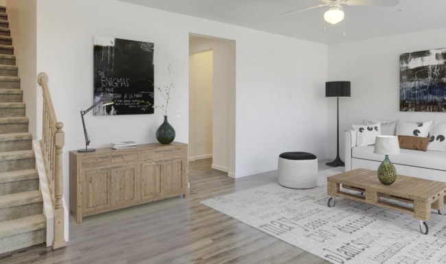 a living room with a staircase