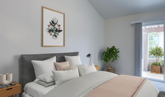 a bedroom with a bed and a table