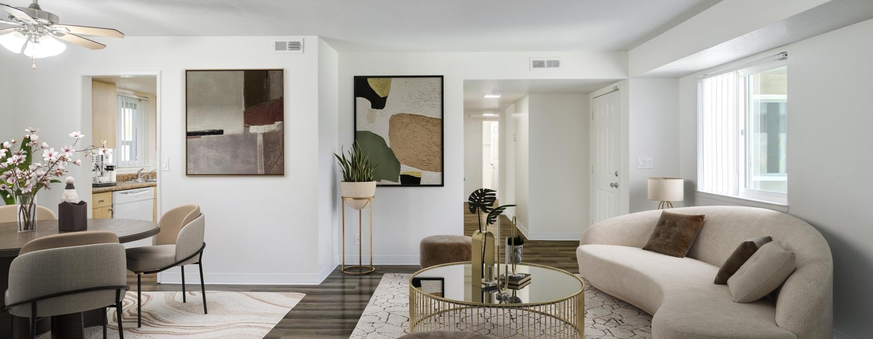 a living room with a couch and chairs