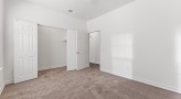 spacious room with a closet