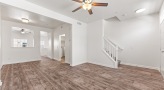 living room area with a connected kitchen