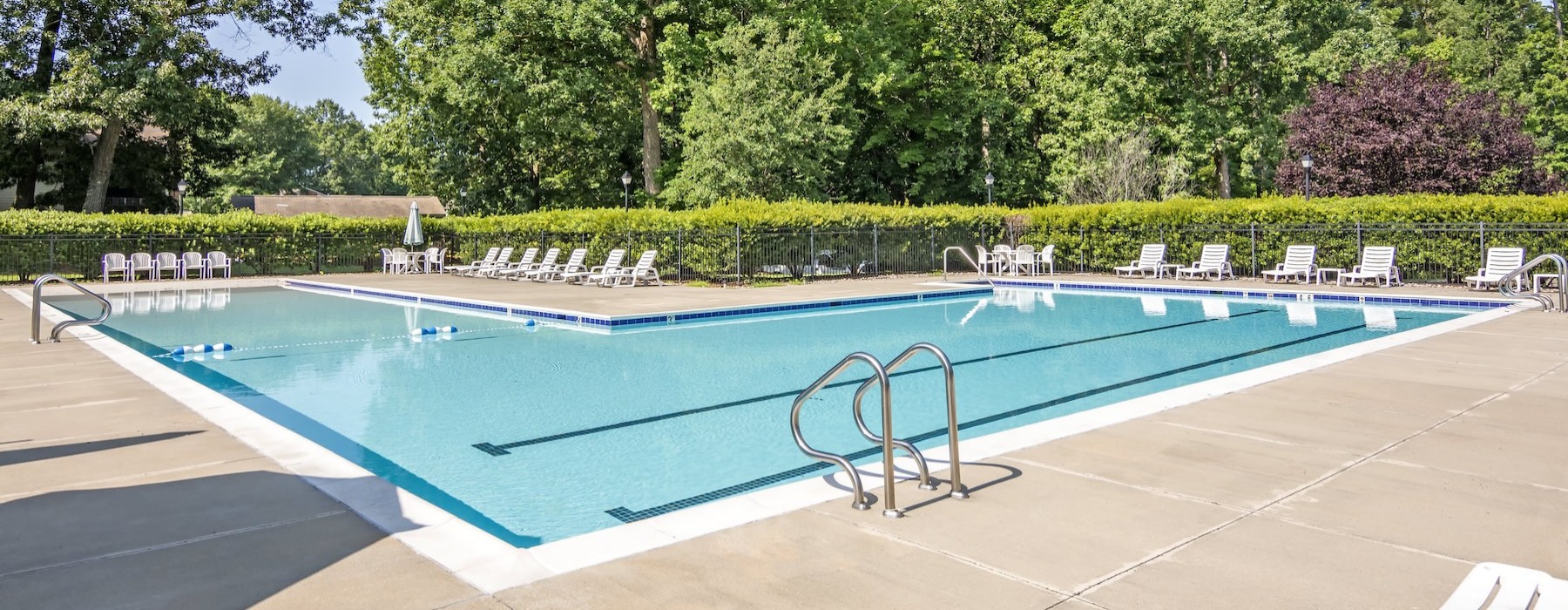 pool with lounge chairs