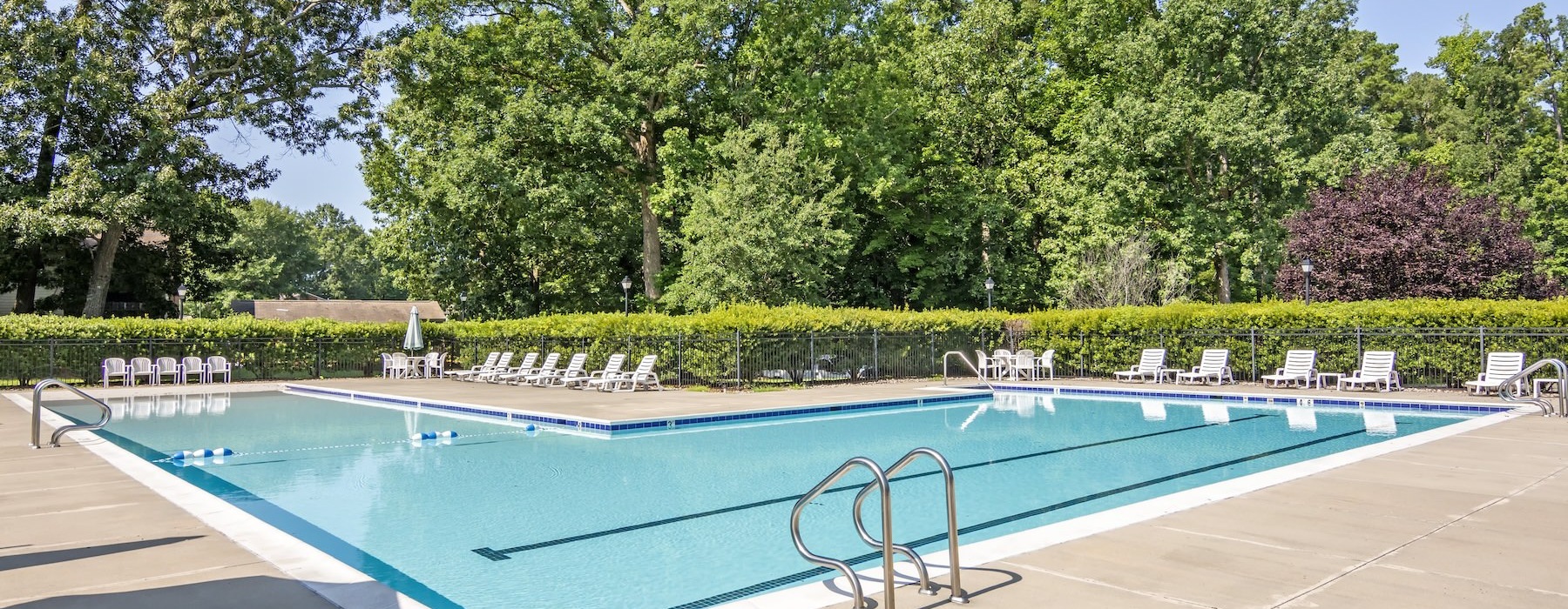 pool with lounge chairs
