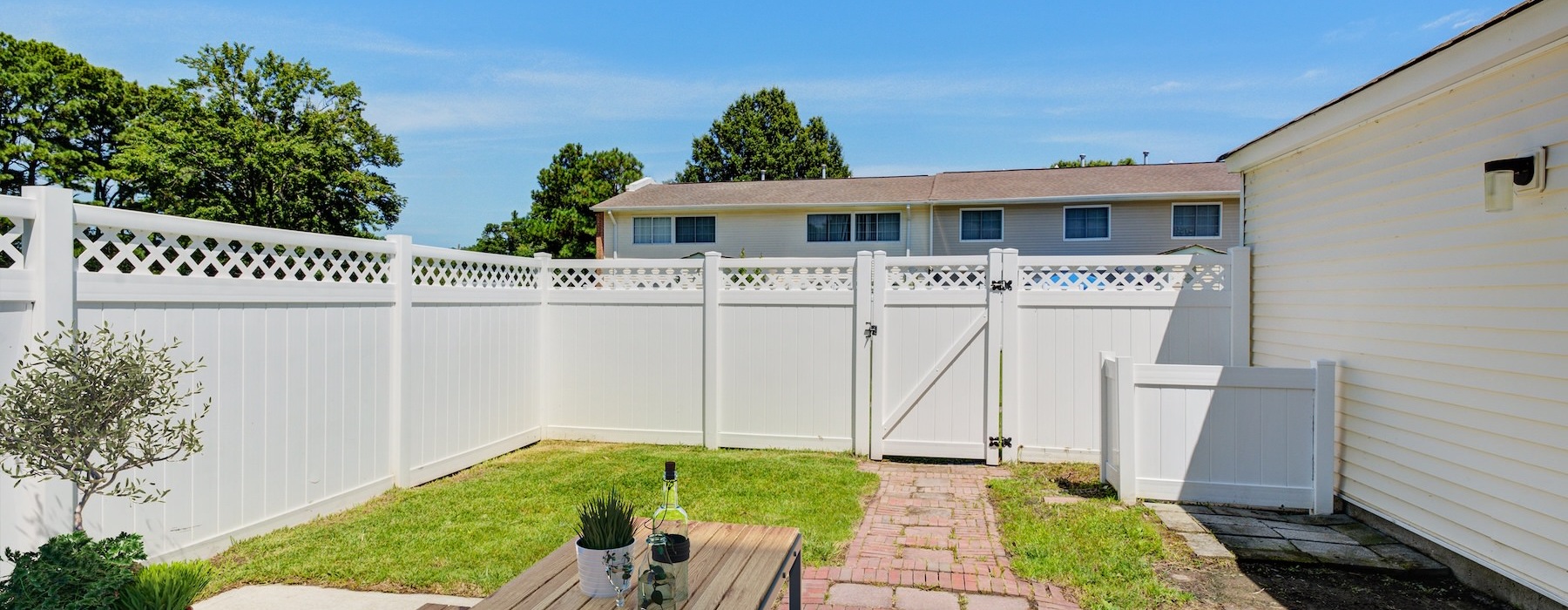 backyard with tall fence