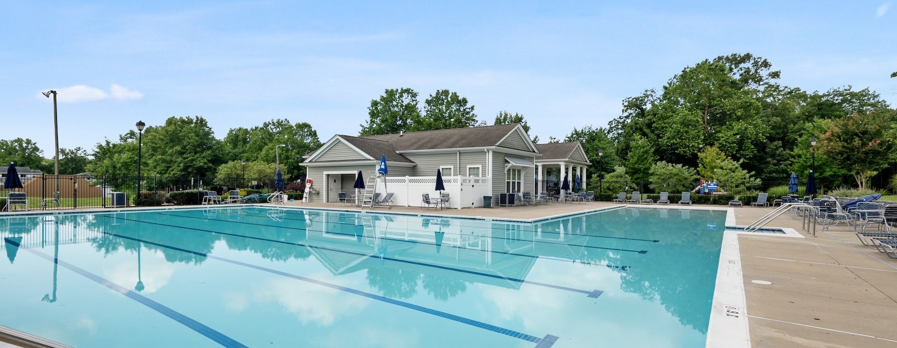 pool with lounge chairs