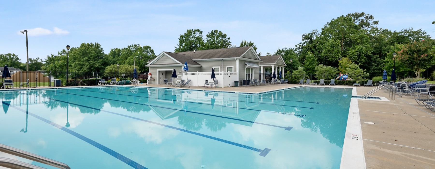 pool with lounge chairs