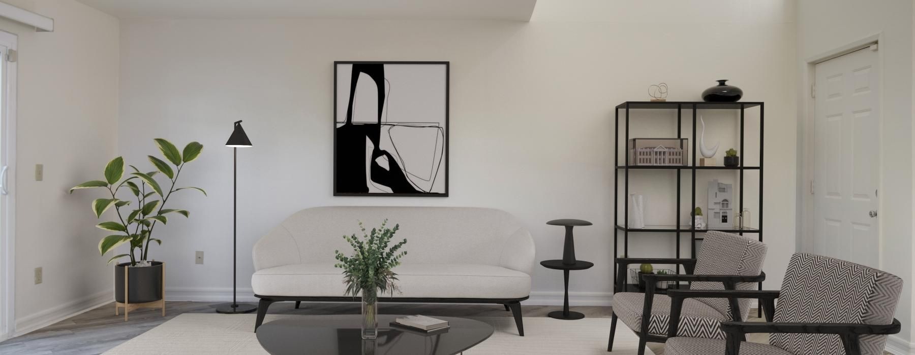 a living room with a white couch and a table