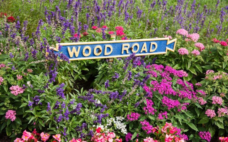 property sign in flower bed 