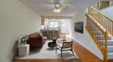 a living room with a staircase