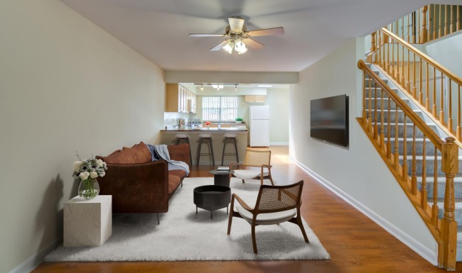 a living room with a staircase