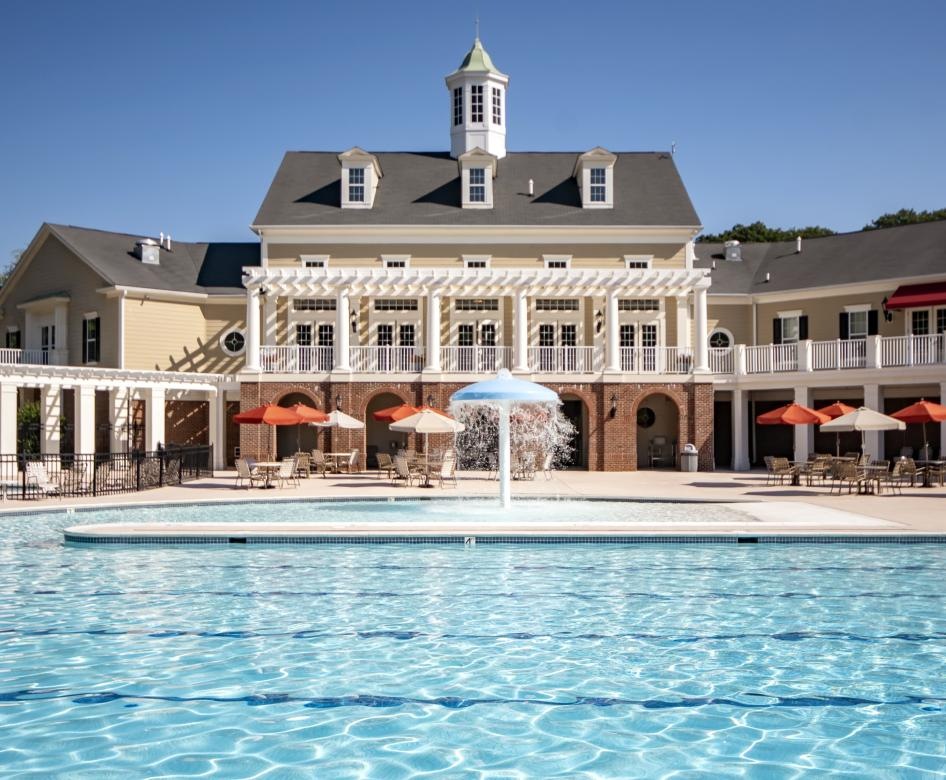 a pool in front of a building