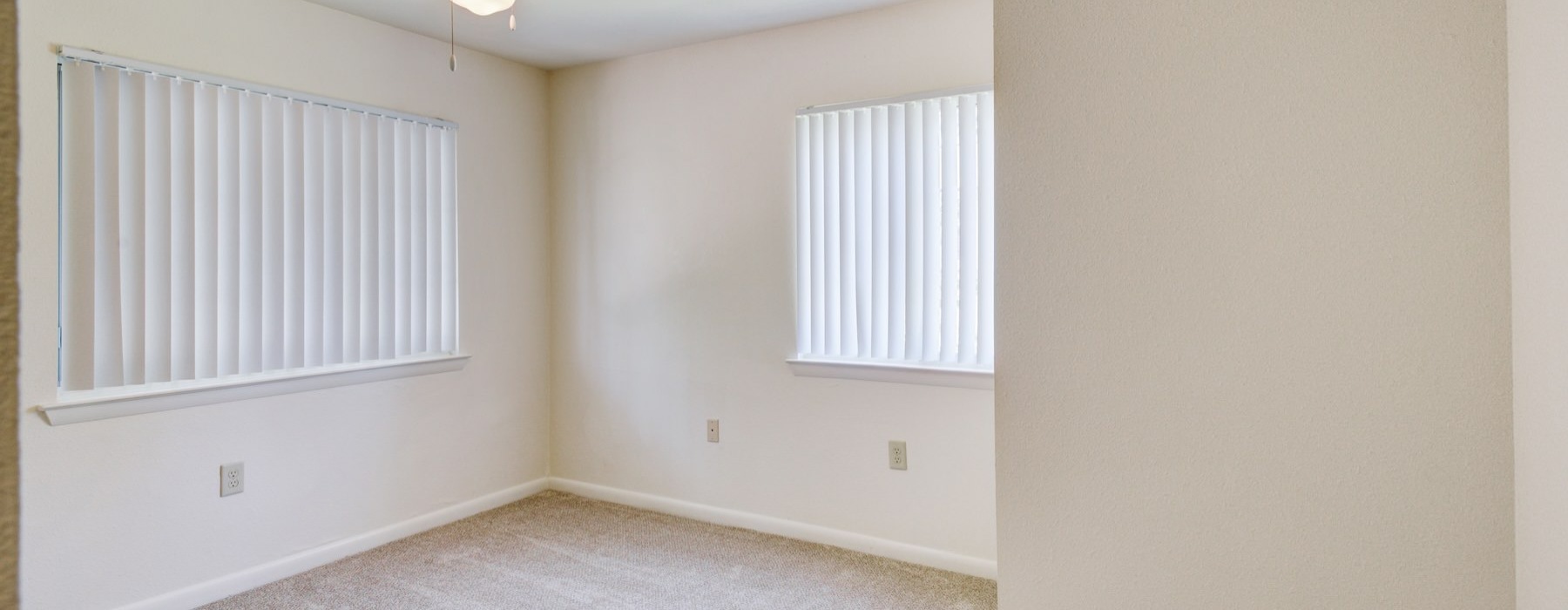 unfurnished bedroom with ceiling fan