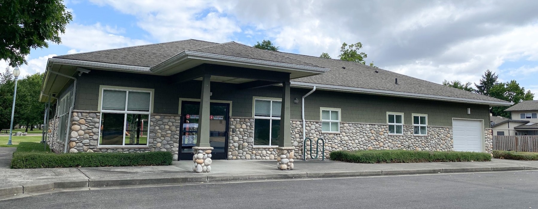 a building with a driveway in front 