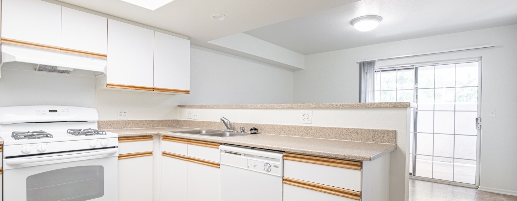 Well-lit kitchen with ample counter space