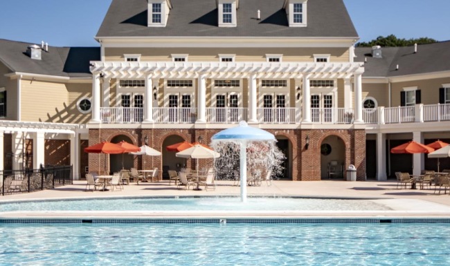 a pool in front of a building