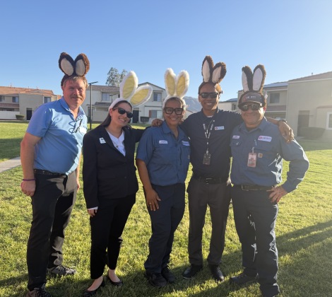 Liberty Team Members dressing up in bunny ears for easter