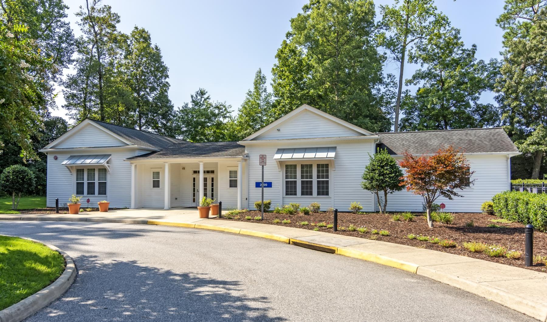 home on a street with trees