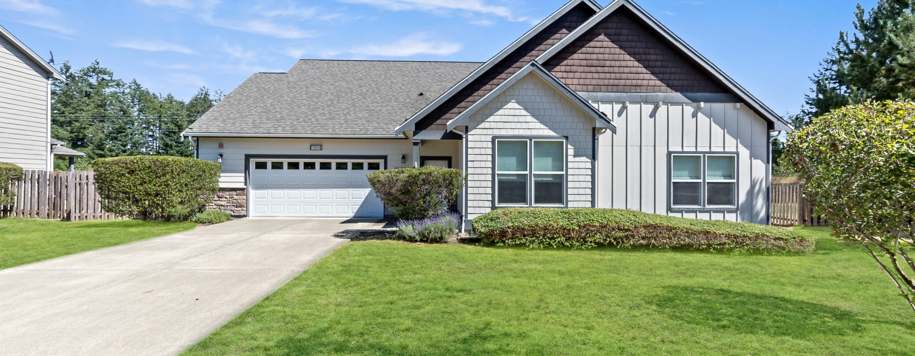 Front exterior of the home with attached two car garage