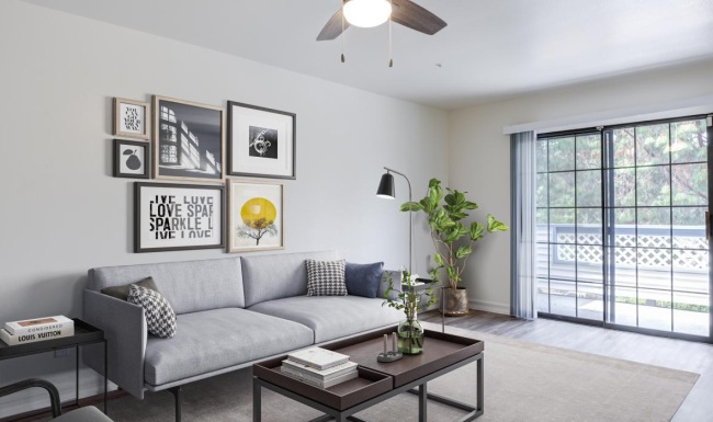 a living room with a couch and a table