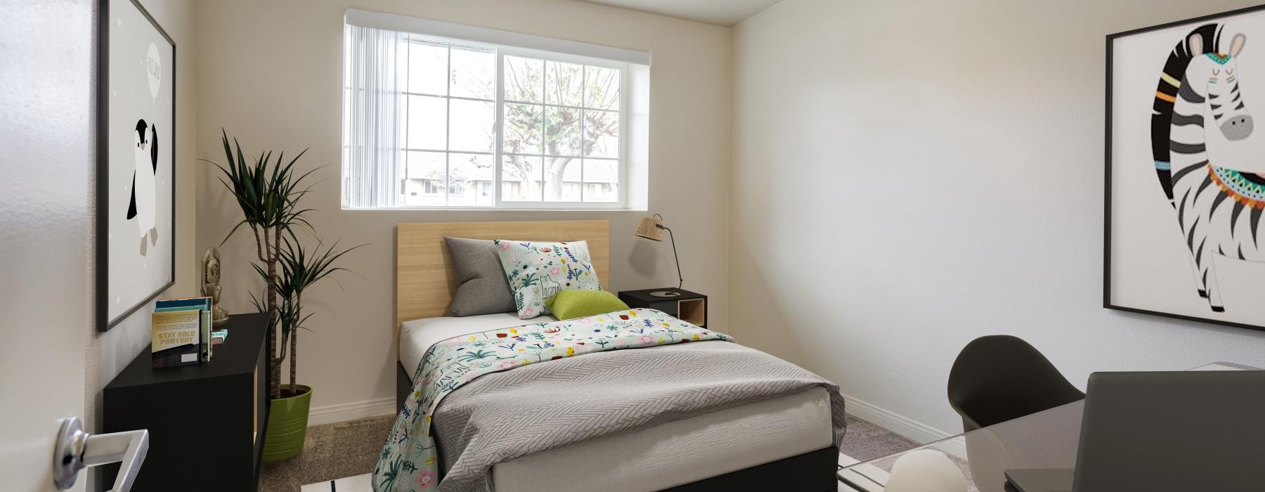 a bedroom with a fan and a bed