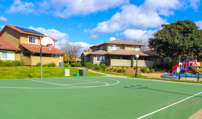 a basketball court with a basketball hoop