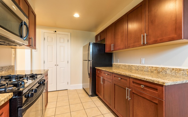 kitchen with stainless steel appliances and wooden cabinets