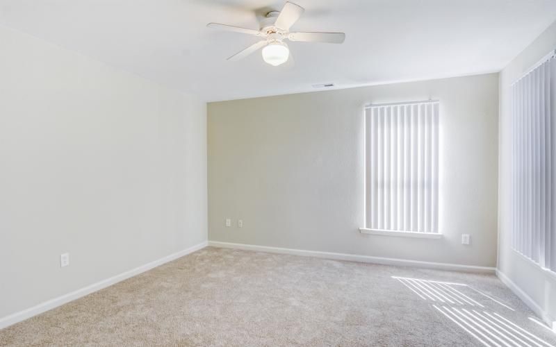 large living room with bright windows