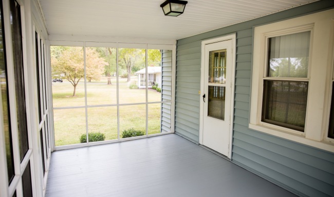 a screened in covered patio