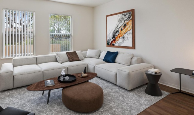 a living room with a couch and coffee table