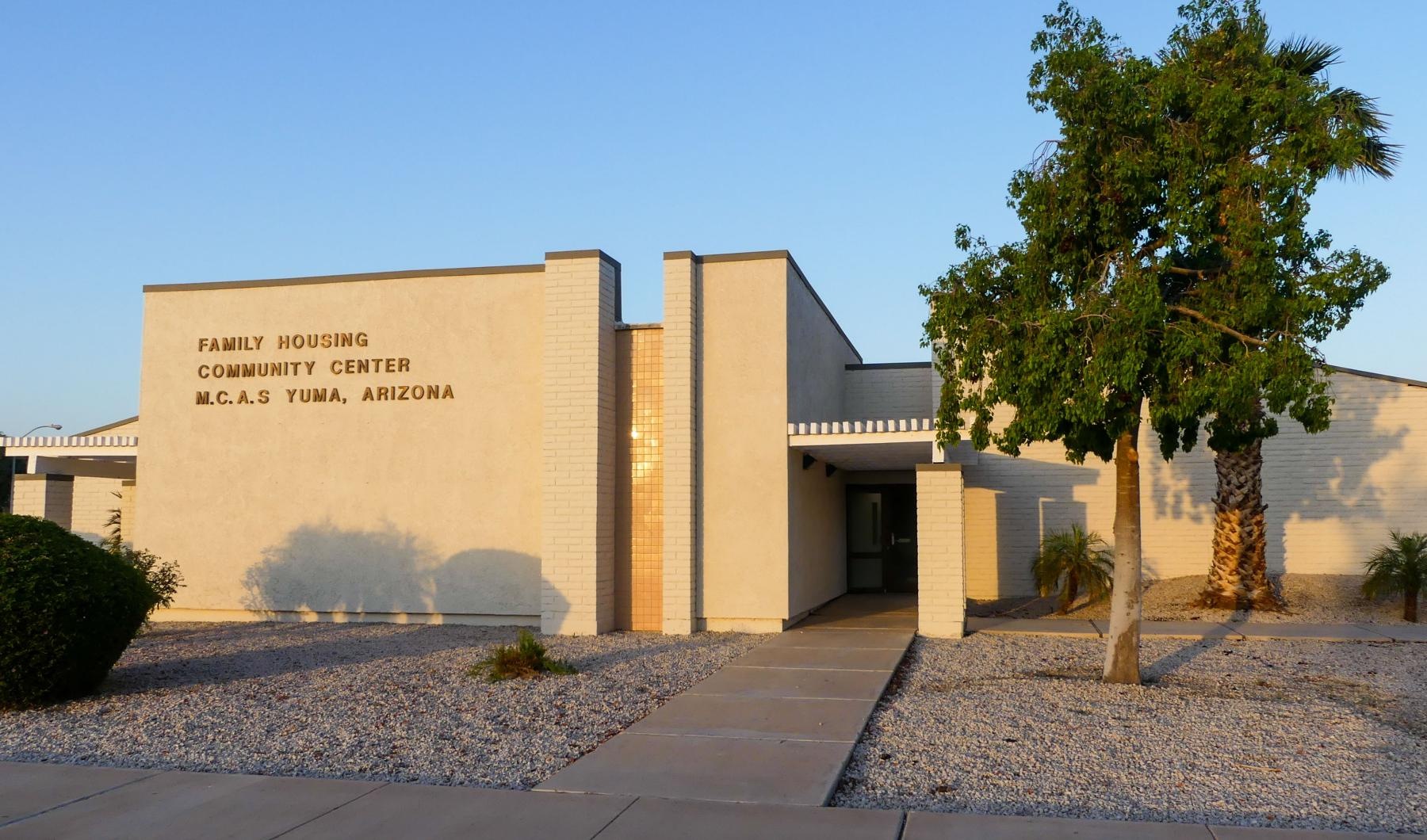 a building with a tree in front