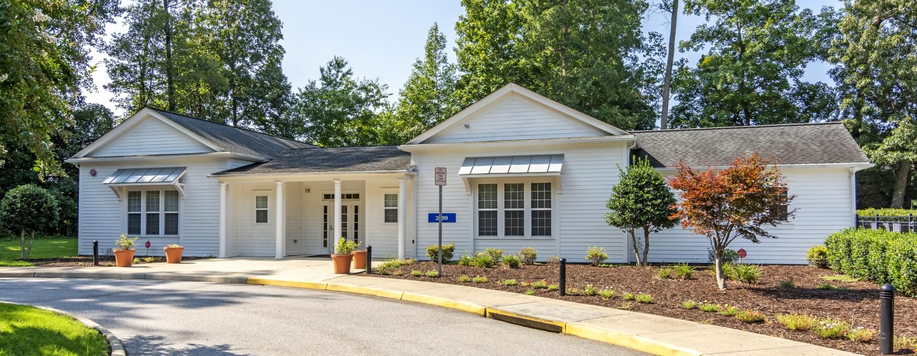 home on a street with trees
