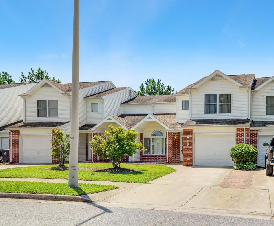 neighborhood street of homes with attached garages