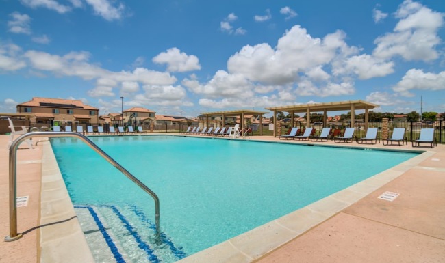 pool with lounge chairs
