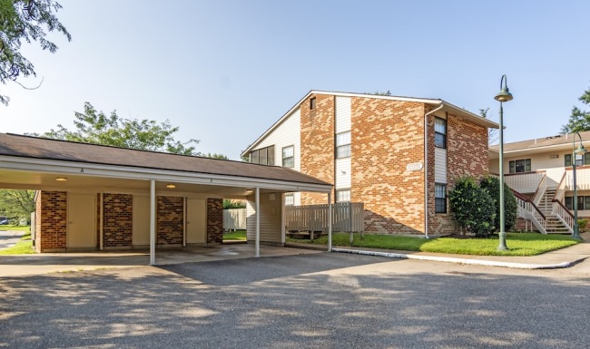 a building with a parking lot