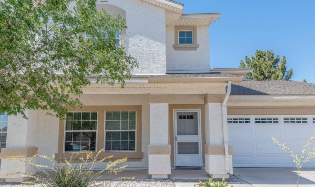 a building with a tree in front